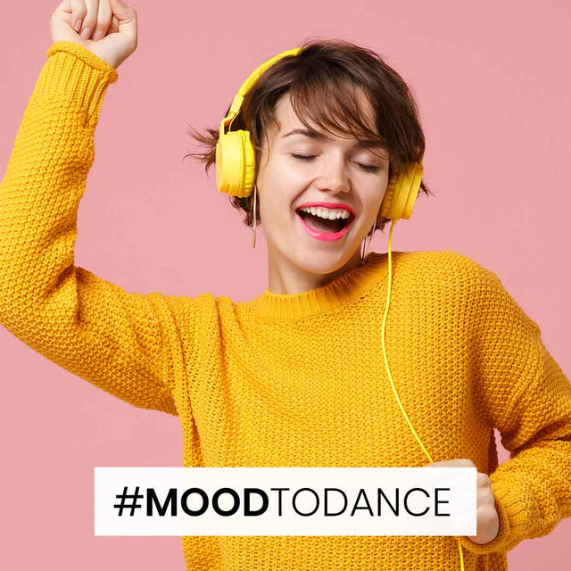 woman smiling while wearing moodmatcher
