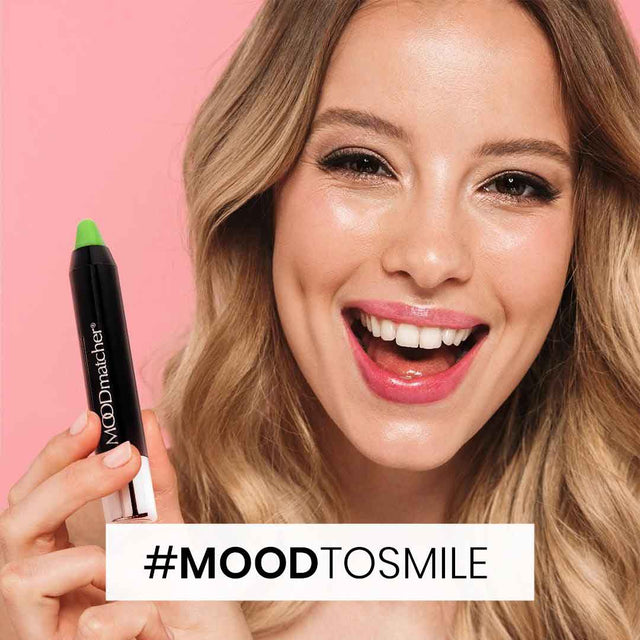 woman smiling while wearing moodmatcher